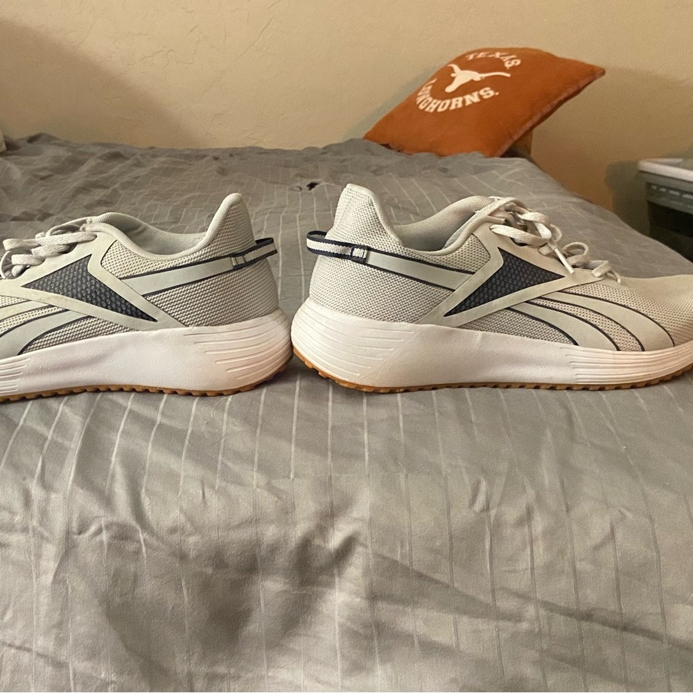 Mens Reebok Lite Plus 3
Size 10.5
Color is Blue, Grey, White